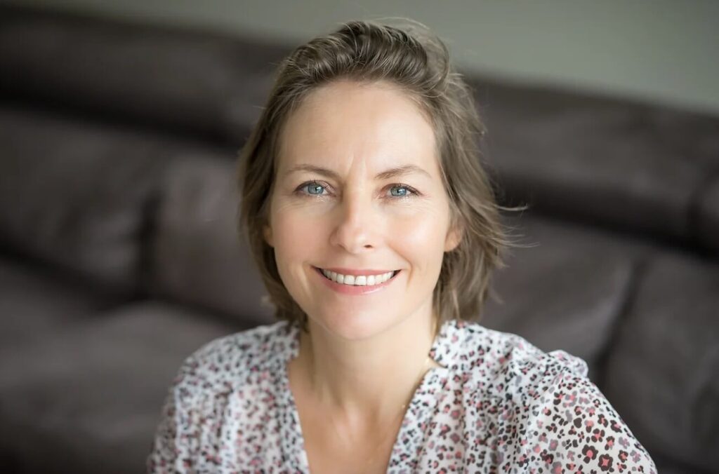 a woman smiling at camera