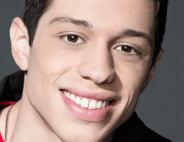 Young Pete Davidson smiling with natural teeth before veneers, featuring a small gap and slight unevenness that added to his authentic look.